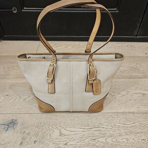 vintage Coach Mini Market Tote bag made of cream canvas with tan leather trim.